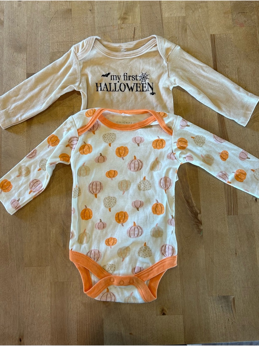 NWOT 2 packchick pea Cream & Orange Pumpkin Print Long-Sleeve Baby One-Piece Duo